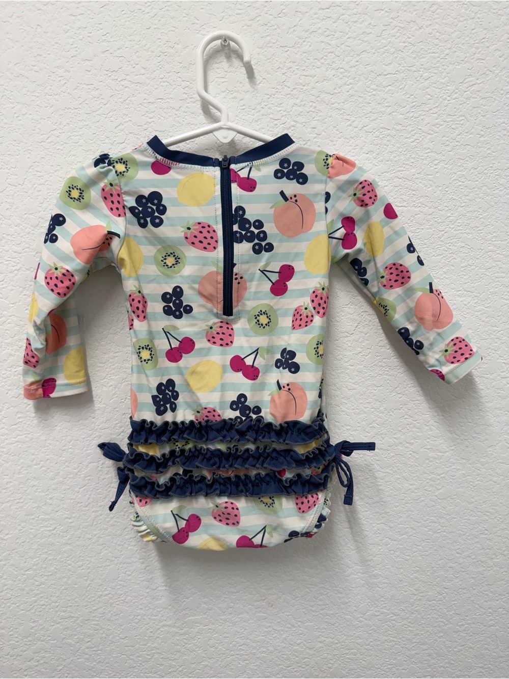 Ruffle Butts Navy-Trim Fruit Print Long Sleeve One-Piece - Picture 4 of 7